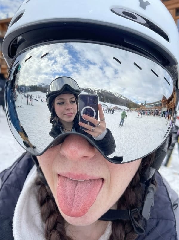 Skier takes playful selfie in Sofia wearing helmet and goggles