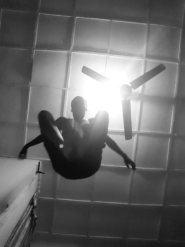 Airborne figure captured in dramatic silhouette photograph in Narayi