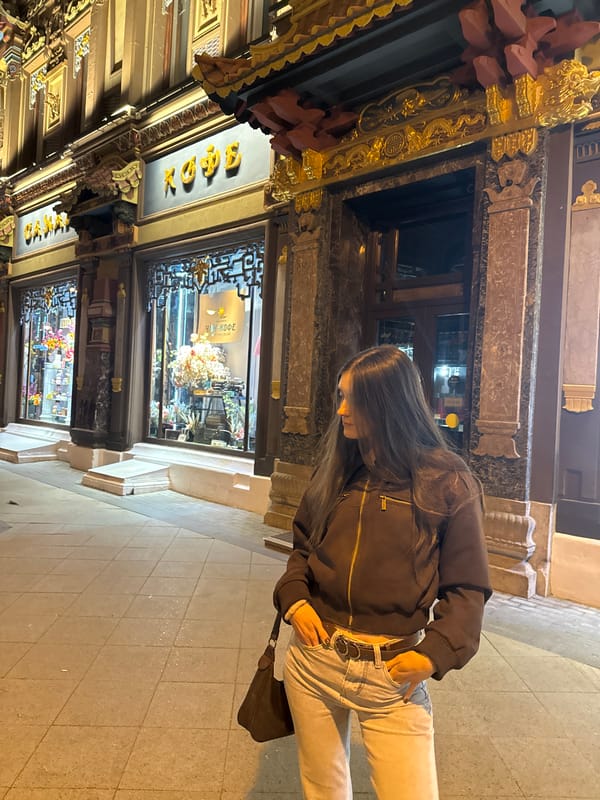 Evening selfie session near Moscow's historic Perlov Tea House
