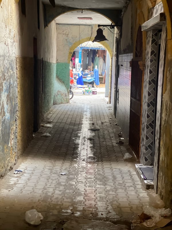Tourist documents Portuguese Castle and Atlantic coastline in Safi, Morocco