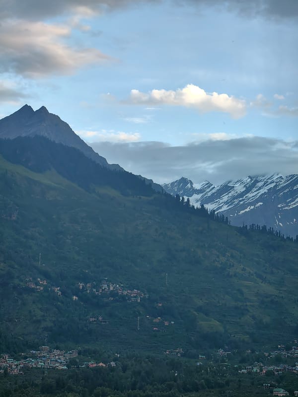 Vashisht village and its surrounding mountain landscape