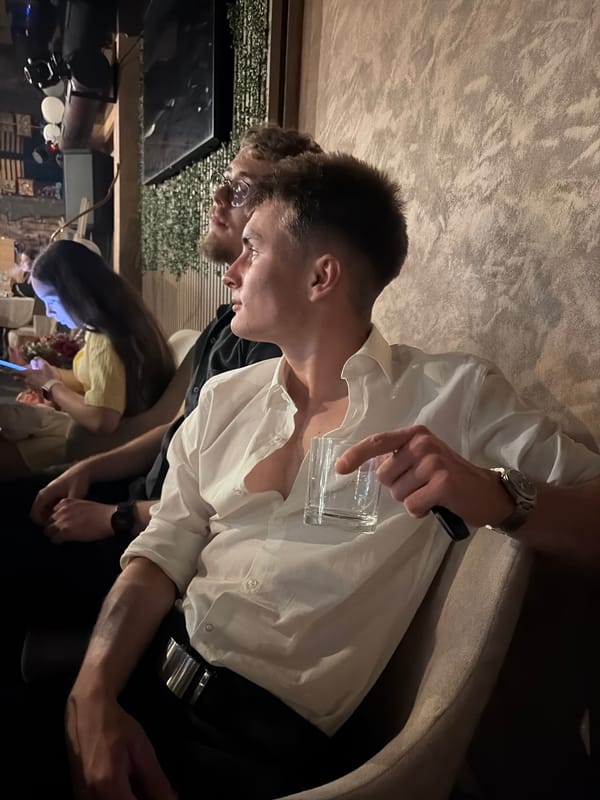 Young men socialize at indoor venue in Slivnitsa, Bulgaria