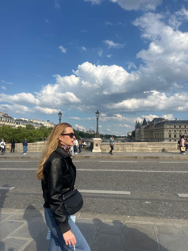 Casual street scenes unfold across central Paris Friday afternoon