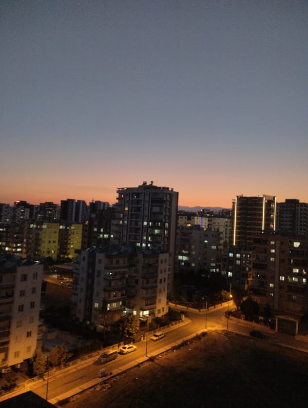 Mezitli skyline at dusk, Mediterranean in the background