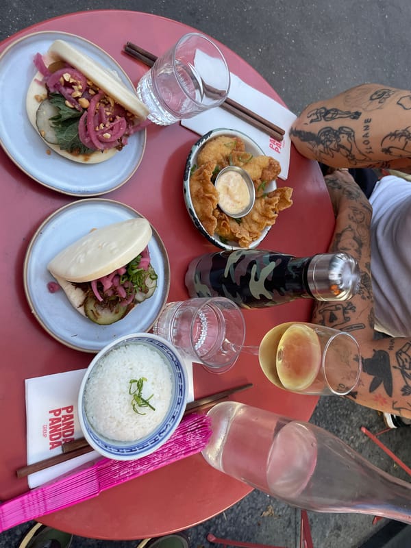 Tattooed diner enjoys casual evening at Paris restaurant