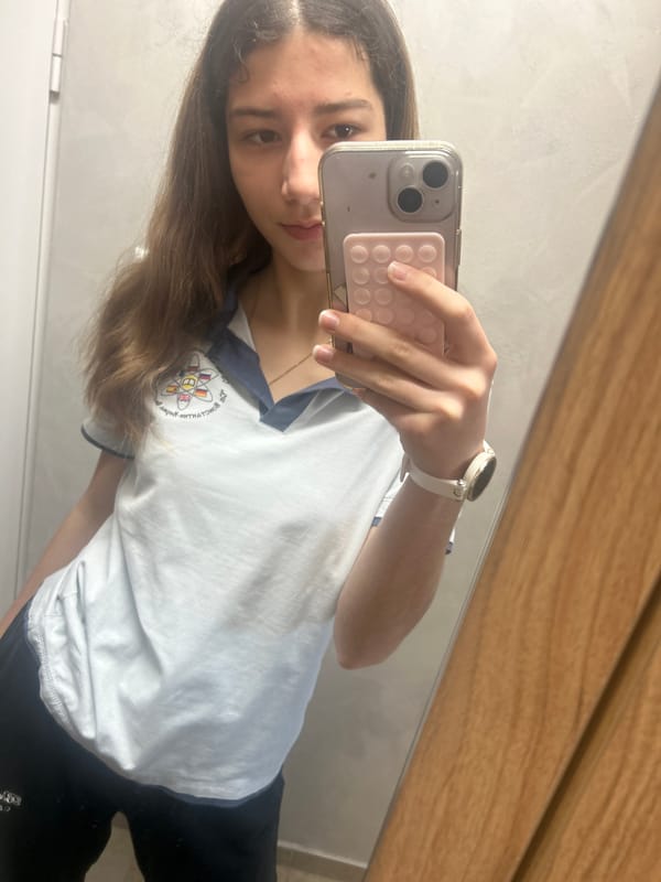 Young woman takes multiple selfies in Ruse, Bulgaria