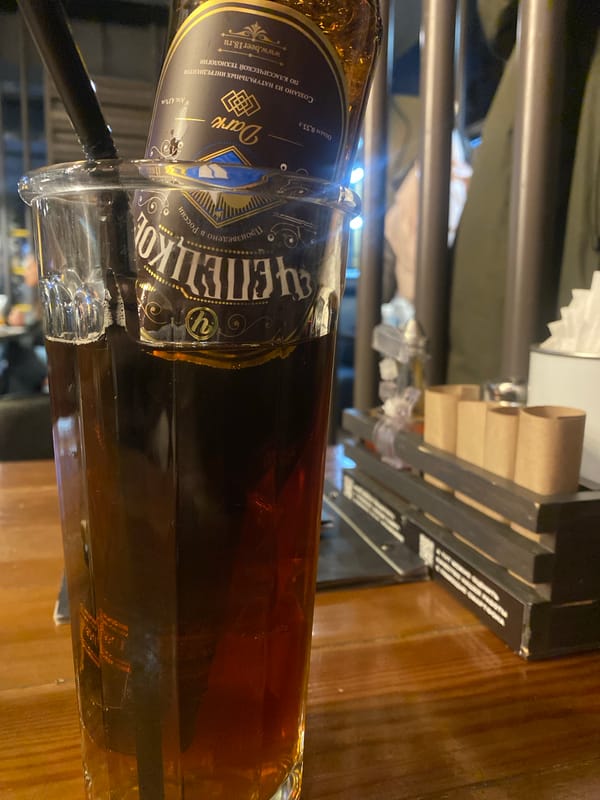 Casual dining moment captured in Izhevsk featuring quesadillas and local beer