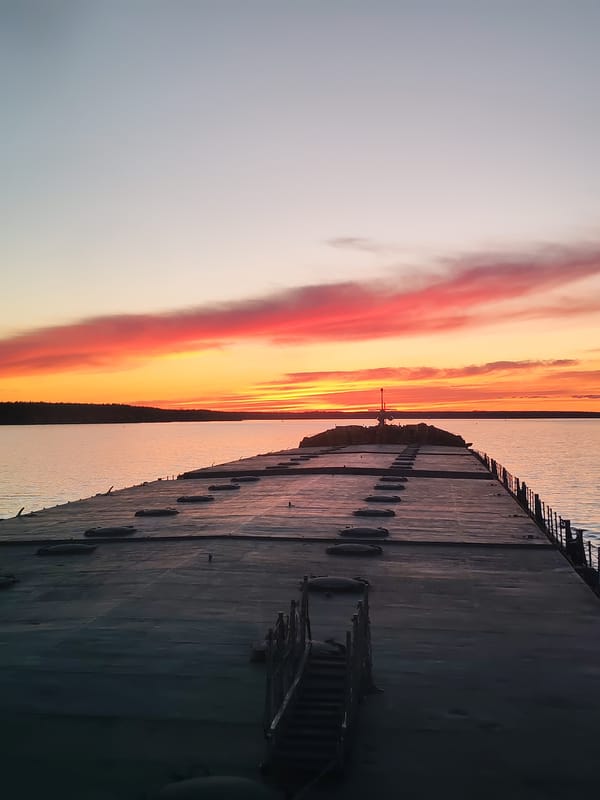 Sunset observed from barge deck in Topornya, Russia