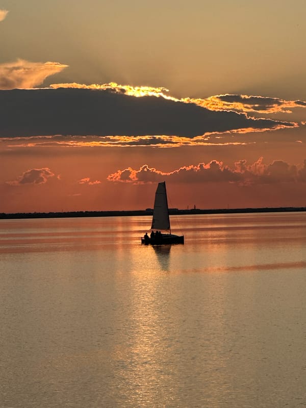 Sailboat at sunset on Lake Kokshetau, Kazakhstan