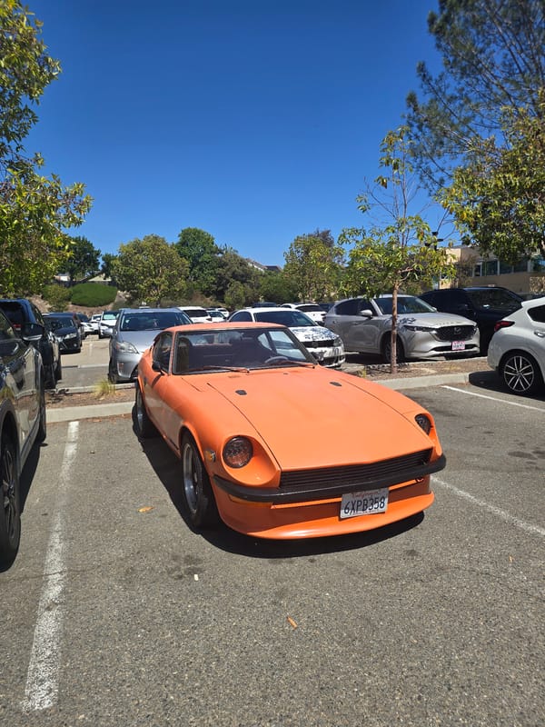 Orange 1970s Datsun 240Z spotted at Encinitas Community Park
