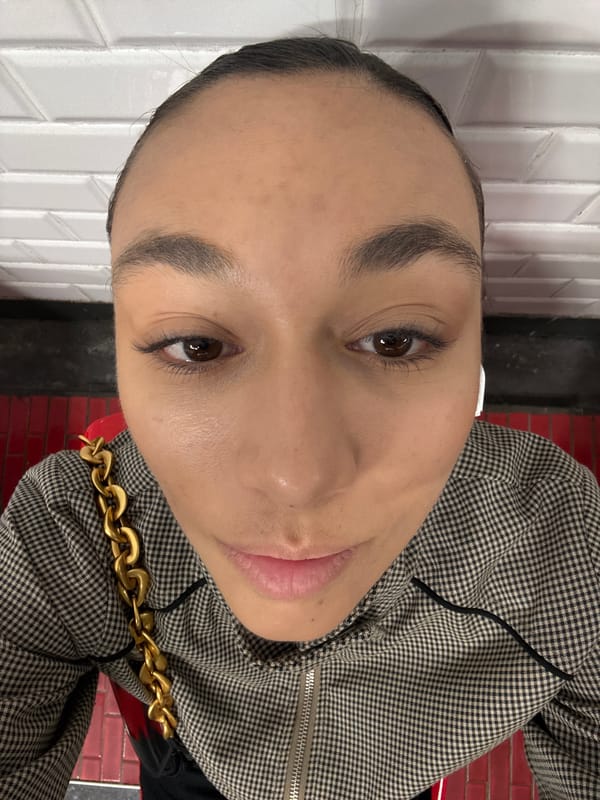 Person takes selfies at Clichy metro station