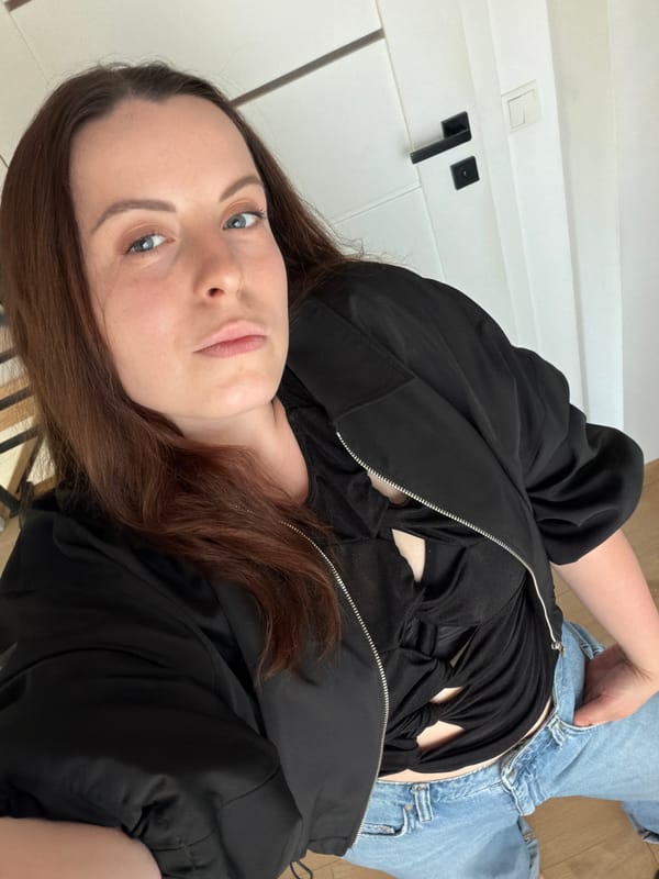 Woman takes mirror selfies in German home