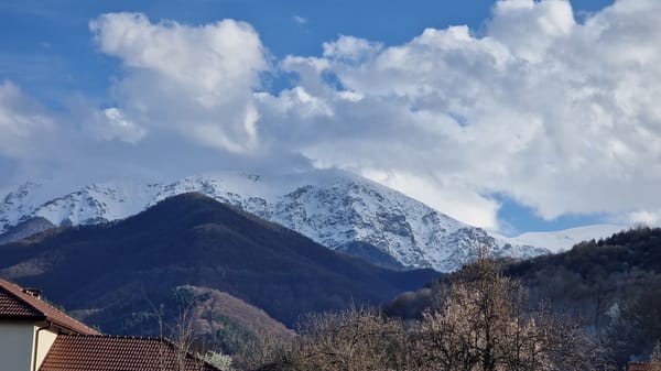 Spring garden and mountain views documented in Apriltsi, Bulgaria