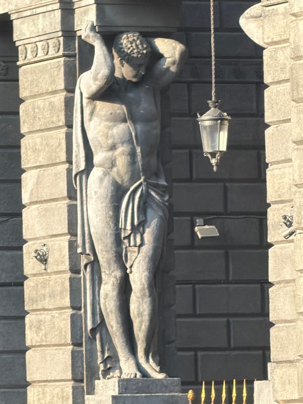 Street scenes captured in Saint Petersburg show sculpture, parked vehicles