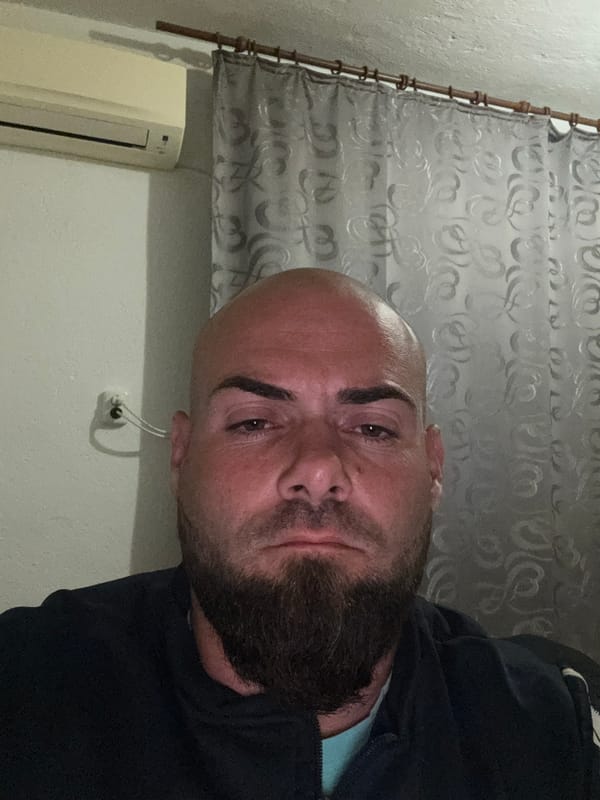 Man documents evening routine with selfies in Bulgarian home