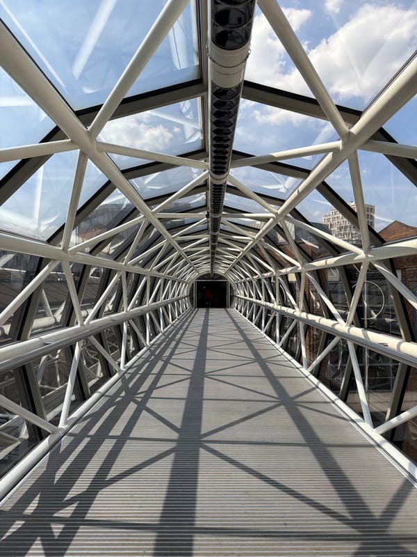 Inside Fenwick and the glass-bridged mall in southwest London