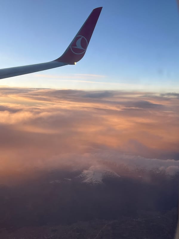 Turkish Airlines passenger documents sunset flight over Montenegro