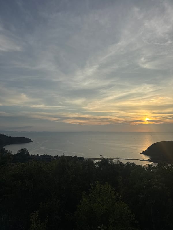Sunset captured over coastal waters in Baan Wang Ta Kien