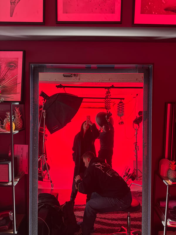 Woman takes selfie in Sofia salon mirror during photo shoot