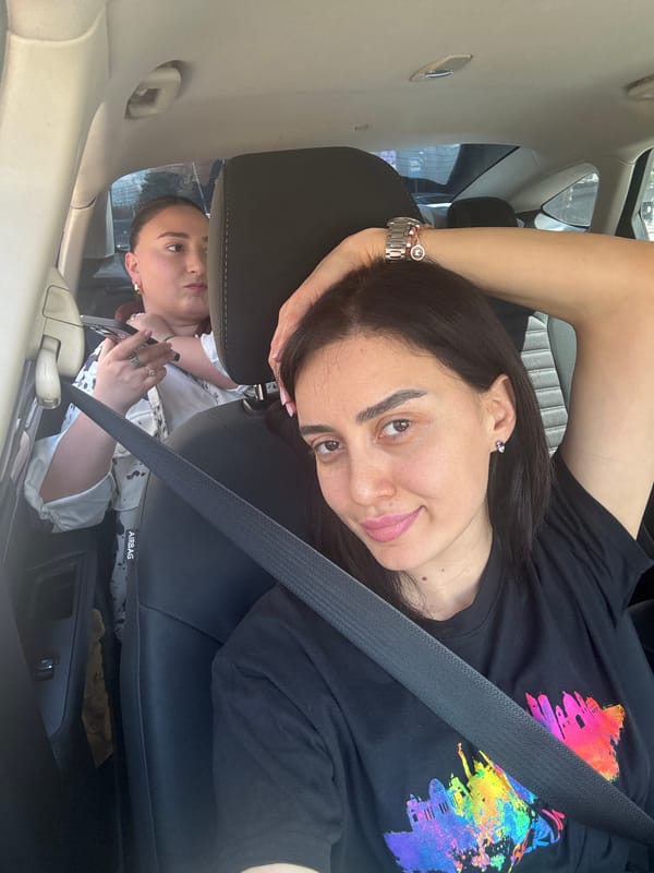 Morning commute through residential Tbilisi streets captured from car