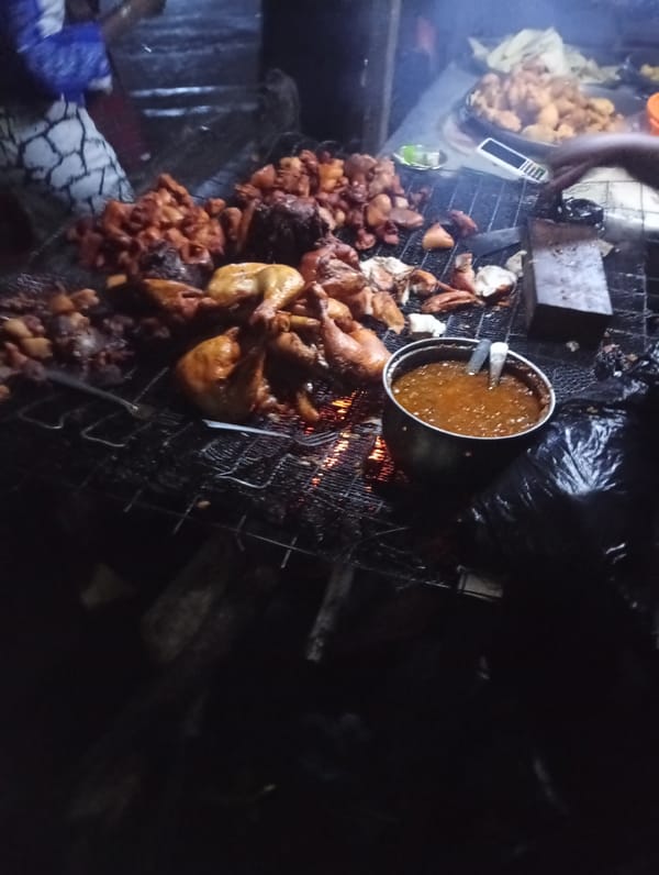 Night food stall buzzing in Nkpor, Nigeria
