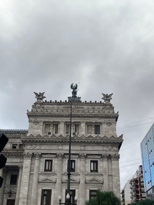 Urban scenes and cheese breads documented during overcast afternoon