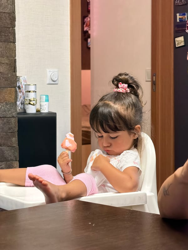 Ice pop time in a Burgas high chair, July afternoon