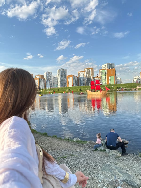 Woman and child photographed near waterfront in Yekaterinburg