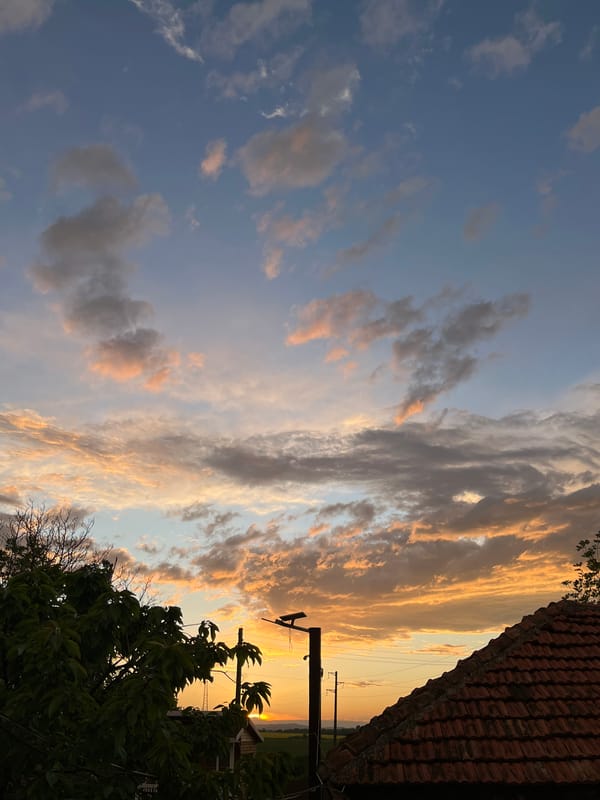 Evening sunset documented over rural Pchelnik, Bulgaria village landscape