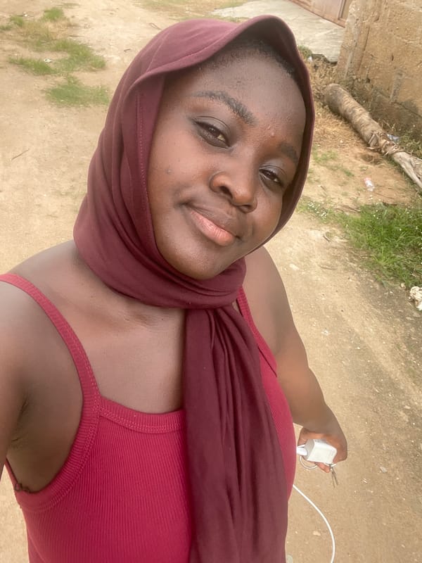 Portraits and power lines in Howayi, Nigeria