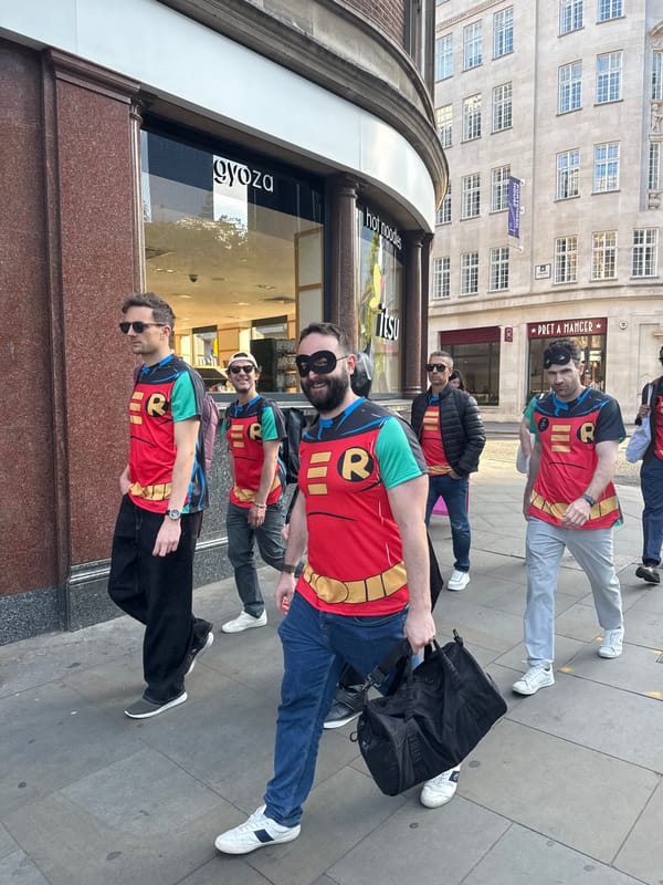 Five Robin costumed figures spotted walking London streets