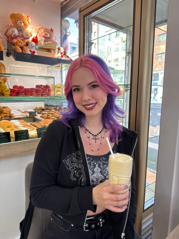 Woman with colorful hair spotted with beverage in Madrid