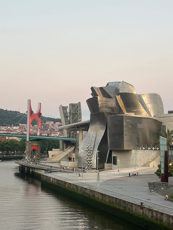 Evening stroll along Bilbao's Nervión riverbank