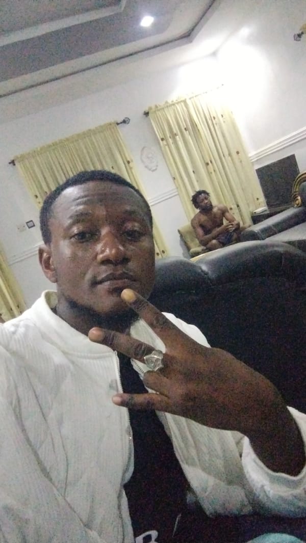 Man in white jacket recorded indoors across multiple locations