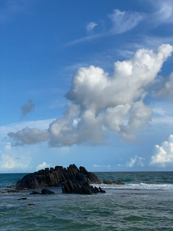 Coastal rock formation observed in clear waters off Talpe