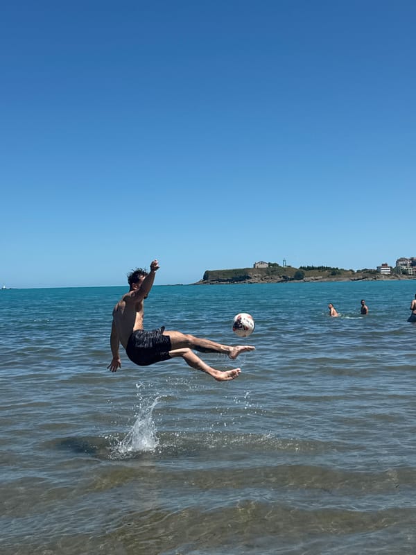 Man plays soccer in shallow waters off Tsarevo coast