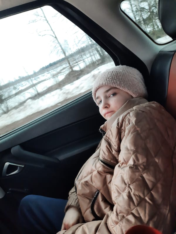 Young person in pink hat spotted in car in Russia