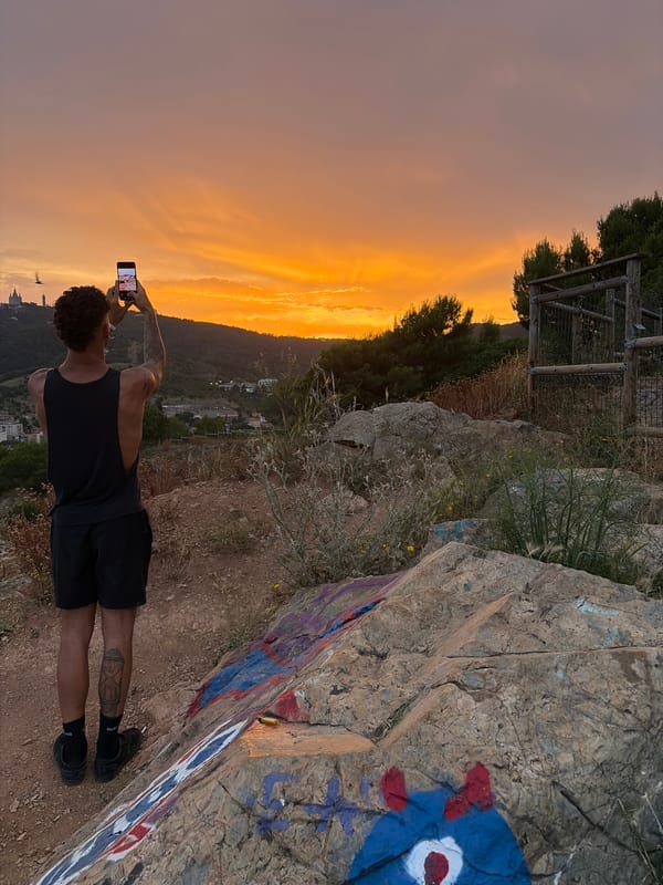 Sunset photography gathering draws people to Barcelona hilltop overlook