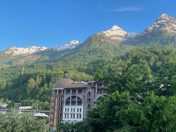 Clear morning skies frame Estosadok's natural and architectural beauty