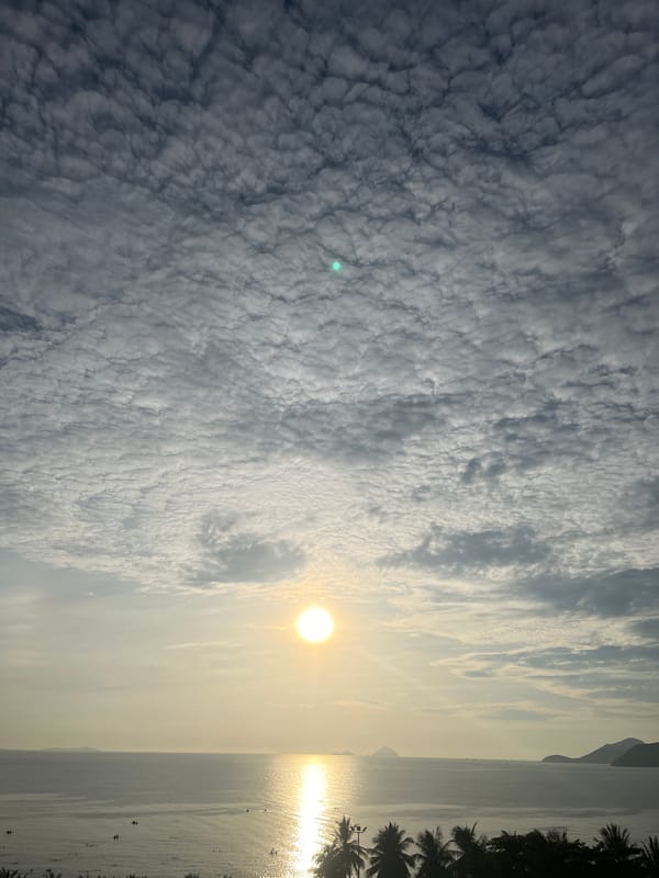 Nha Trang coastline at golden hour, sea and city