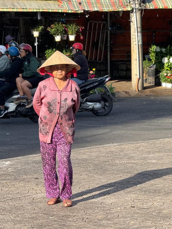 Daily street life documented in Da Lat market district