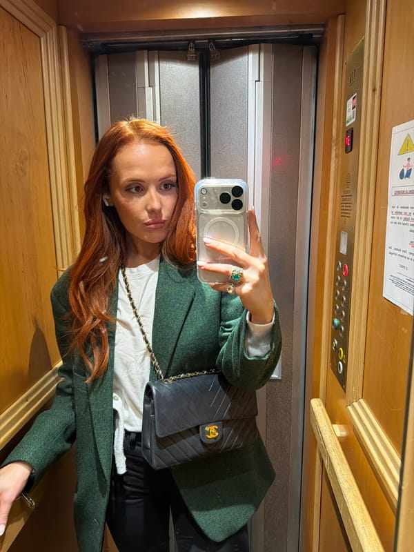Woman Takes Elevator Selfie in Paris