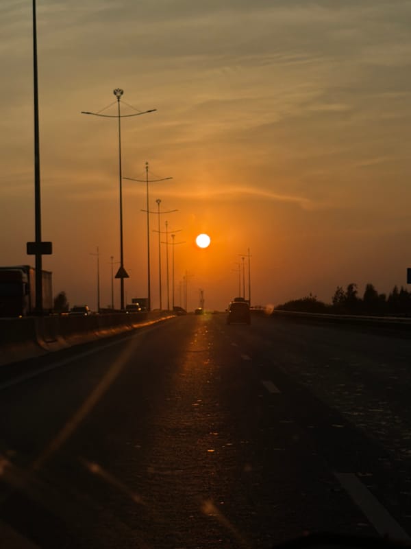 Golden hour on a Perm highway bridge at sunset