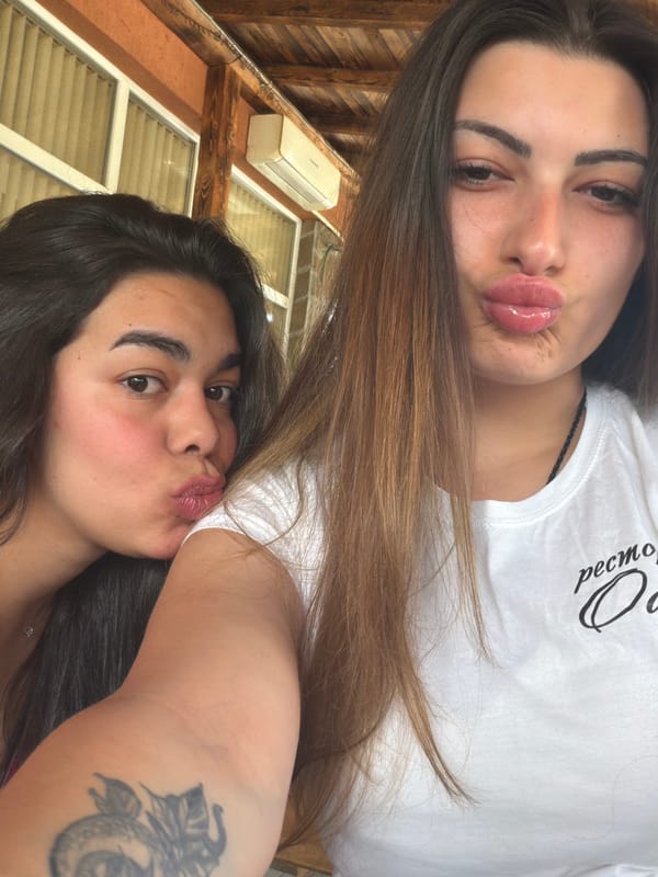 Young women take selfies in Troyan, Bulgaria