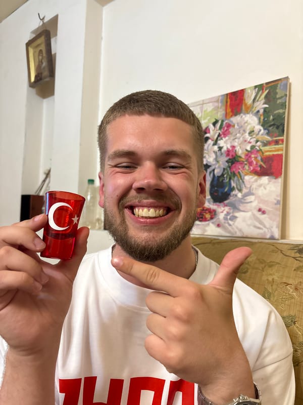 Apartment selfie in Lida with a Turkish flag shot glass