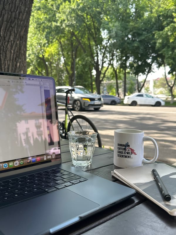 Morning outdoor workspace spotted at Tashkent cafe patio