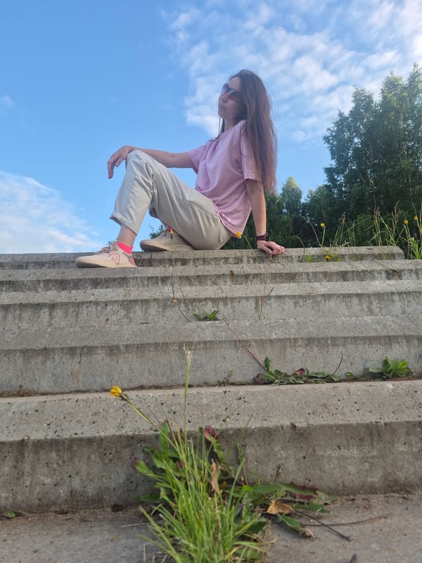 Woman photographed on steps in Chaikovsky, Russia