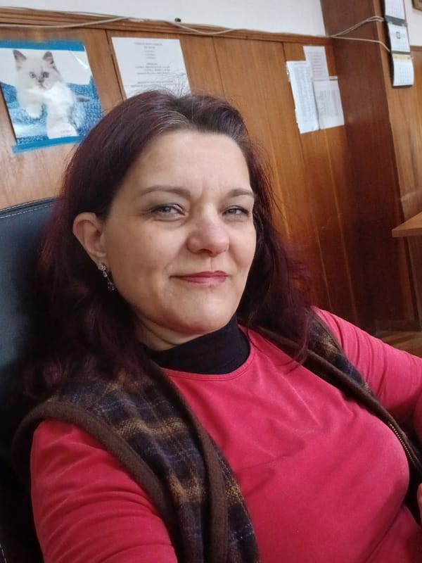 Woman in red shirt observed resting in Vratsa, Bulgaria