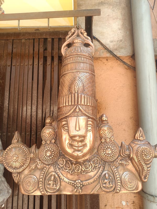 Hindu sculpture and clock tower documented in Bengaluru