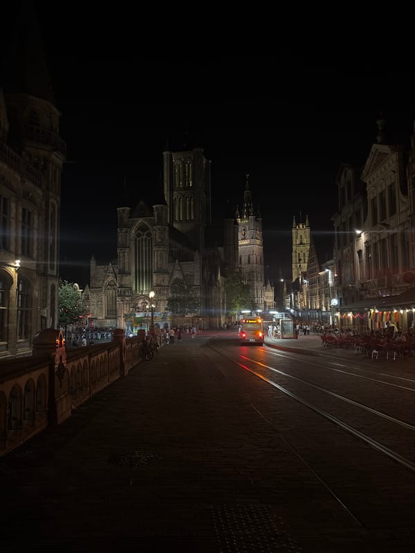 Ghent's illuminated canal district on a summer night